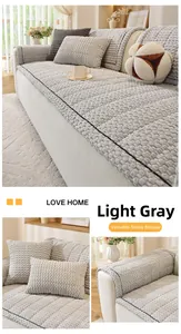 Detail view of light grey corduroy sofa cover with textured non-slip 3D bubble fabric
