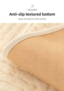 Close-up of non-slip particle backing for cream-colored irregular sofa cover