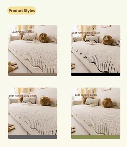 Detail of plush sofa covers with scalloped edges in coffee, black, grey, and green colors