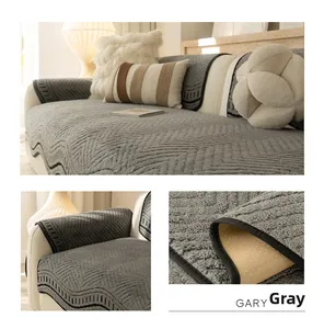 Detailed view of gray plush sofa cover showing herringbone texture and anti-slip backing