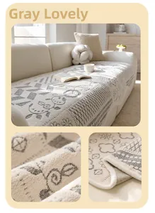 Macro shot of grey plush sofa cover featuring sheep pattern and soft fabric texture details