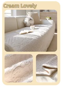 Detail of creamy white plush sofa cover showing floral embossing and thick velvet texture