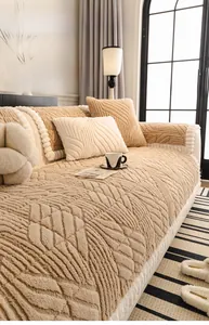 Detail of light camel sherpa sofa cover with 3D wave texture and soft plush fabric