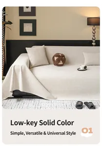 Detail of waterproof beige sofa cover with elegant draping and matching pillow cases