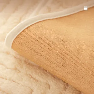 Modern cream-colored non-slip irregular sofa cover with textured fabric and anti-skid backing