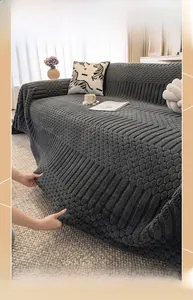 Close-up of grey thickened waffle texture cotton velvet sofa cover with non-slip knit weave