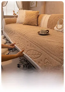Detail of khaki plush sofa cover showing thick fabric texture and Lambswool trim