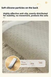 Detail of plush sofa cover showing non-slip silicone backing and 45-degree grip test