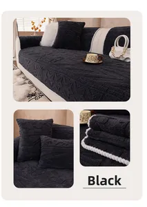 Close-up of embossed leaf pattern on thick charcoal plush sofa cover fabric texture
