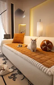 Close-up of caramel lamb fur sofa cushion with decorative white ruffled edges