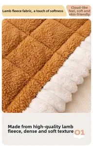 Close-up of thick sherpa fleece fabric in caramel and cream showing soft wool texture