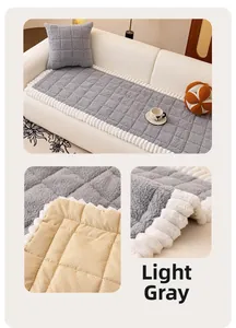 Close-up of thick gray plush sofa cushion with non-slip backing and wavy trim