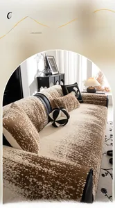 Detail view of brown cotton velvet sofa mat with decorative cushions in a living room