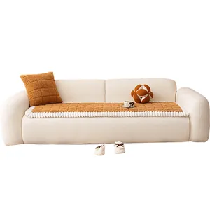 Caramel lamb wool sofa cushion with grid quilting and white wavy edges for winter comfort