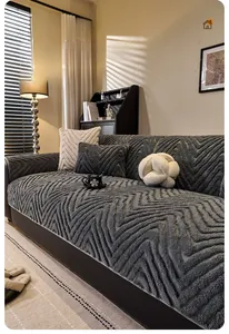 Macro view of dark grey thick velvet sofa cover with modern 3D wavy texture