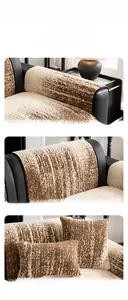 Detail view of anti-slip warm plush sofa cover with striped texture and soft velvet finish