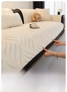 Detail of cream wavy textured fleece sofa cover showing anti-wrinkle and elastic fabric