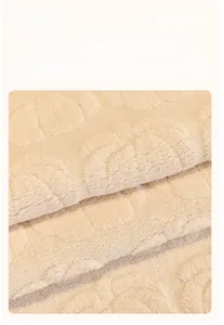Macro view of beige cotton velvet sofa cover with embossed floral texture and soft fleece