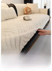 Close-up of cream white thick plush sofa cover with wave texture and non-slip backing