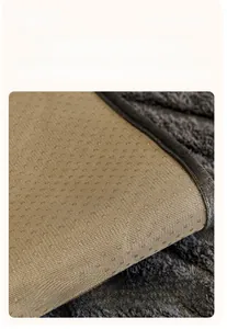 Detail of beige velvet sofa cover with silicone anti-slip backing and grey velvet piping