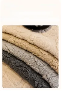 Close-up of thick plush sofa cover fabric showing warm texture and soft pile