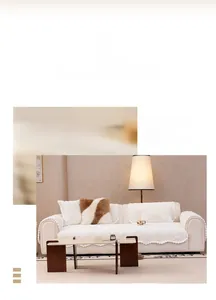 Close-up of white rabbit plush sofa cover with geometric textures and decorative pompoms