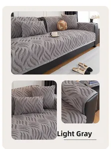 Macro shot of light grey thickened sofa cover with 3D wave knit texture for autumn winter