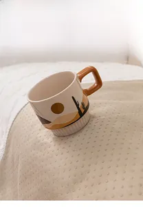 Detail of anti-slip grain bottom on beige faux rabbit fur sofa cover with a ceramic cup