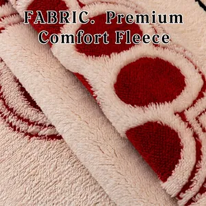 Thick red polka dot sherpa fleece sofa cover with non-slip texture and warm plush finish