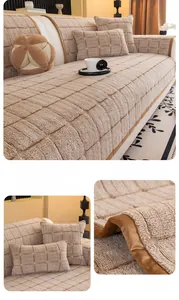 Close-up of light coffee thickened velvet sofa cover with waffle texture and matching pillows