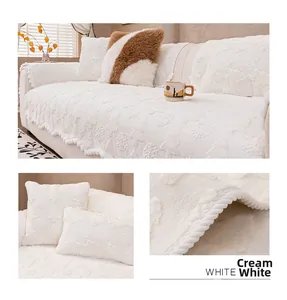 Detail of milk white faux rabbit fur sofa cover with 3D snowflake and tree patterns