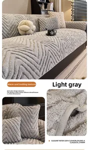 Close-up of light grey chevron textured velvet sofa cover with premium stitching