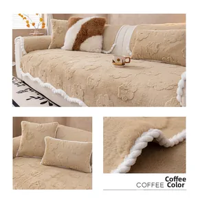 Detail of coffee plush sofa cushion with embossed petals and white pom-pom trim