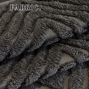 Deep grey Sherpa fleece sofa cover with thick striped texture for modern warmth