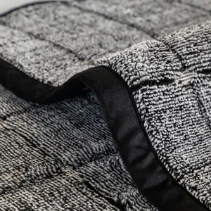 Grey woven thick sofa cover with wide black velvet piping edge for anti-slip protection