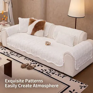 Creamy white rabbit faux fur sofa cover with 3D floral jacquard and decorative pompom fringe