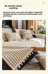 Close-up of thick checkered sofa cover with fringe detail and soft chenille texture