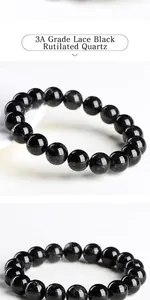 Detailed macro view of 3A grade black rutilated quartz beads showing natural lace patterns
