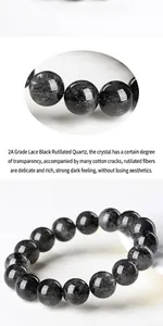 Macro detail of natural black rutilated quartz beads with visible lace inclusions