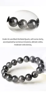 Macro detail of natural black rutilated quartz bracelet beads with fine hair-like crystals