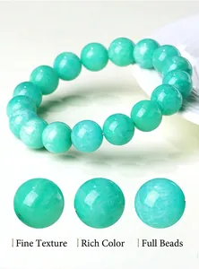 Detailed close-up of natural green Amazonite round beads with smooth texture and fine luster