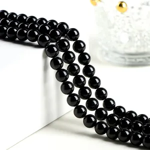Strands of polished natural 7A black tourmaline beads for DIY jewelry making and crafting