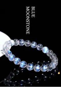 Detailed view of high-quality blue moonstone beaded bracelet with luminous blue flash effect