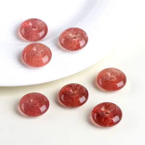 Polished natural strawberry quartz donuts pendant with translucent red inclusions