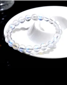 Close-up of natural blue moonstone bracelet showing high transparency and schiller effect