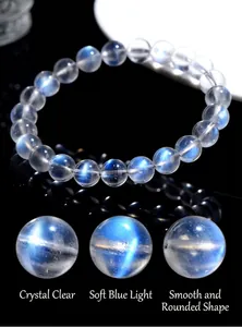Macro detail of natural blue moonstone bracelet with high clarity and glowing blue sheen