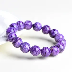 Bracelet en perles de charoïte naturelle aux reflets violets et texture soyeuse