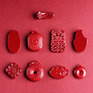 Nine-piece set of red cinnabar pendants in traditional Chinese Ruyi and fortune shapes