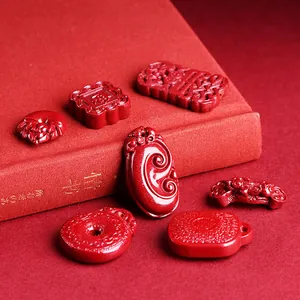 Carved Cinnabar pendants collection with Ruyi lock and fish motifs for jewelry making