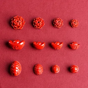 Red cinnabar beads in lotus flower, ingot, and tortoise shell shapes for jewelry making